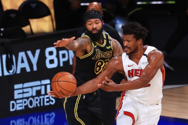 Markieff Morris #88 of the Los Angeles Lakers defends Jimmy Butler #22 of the Miami Heat during the fourth quarter in Game Five of the 2020 NBA Finals at AdventHealth Arena at the ESPN Wide World Of Sports Complex on October 9, 2020 in Lake Buena Vista, Florida. PHOTO | AFP