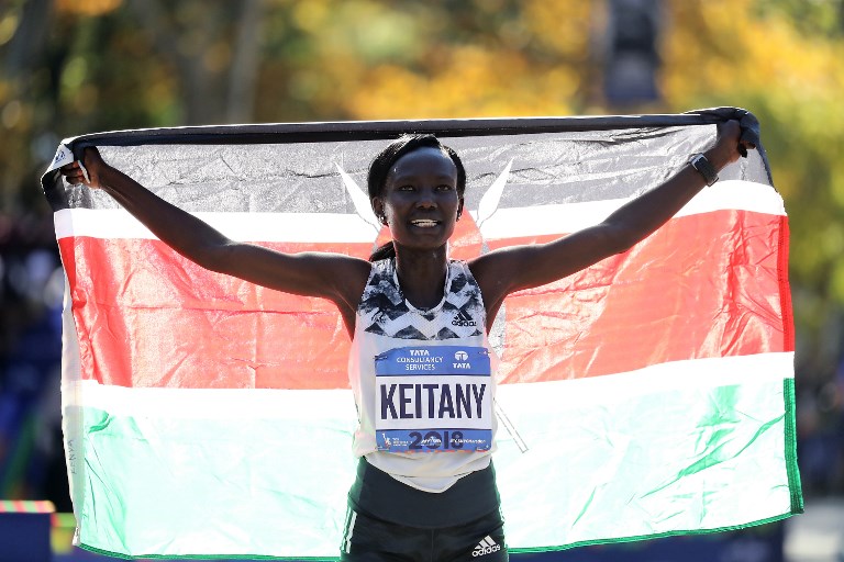 Mary Keitany of Kenya celebrates her win at the finish line after she won the Women's Division of the 2018 TCS New York City Marathon on November 4, 2018 in Central Park in New York City. Elsa/Getty Images/AFP 