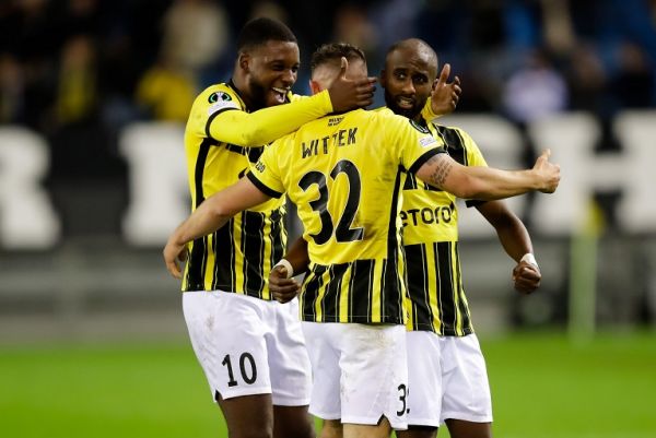 Maximilian Wittek of Vitesse celebrates his sides first goal with Riechedly Bazoer of Vitesse and Eli Dasa of Vitesse during the Group D - UEFA Europa Conference League match between Vitesse and Tottenham Hotspur at the Gelredome on October 21, 2021 in Arnhem, Netherlands. PHOTO | Alamy