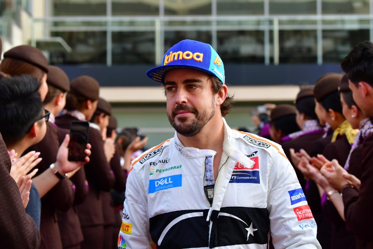 McLaren's Spanish driver Fernando Alonso walks ahead of the Abu Dhabi Formula One Grand Prix at the Yas Marina circuit on November 25, 2018, in Abu Dhabi. PHOTO/AFP