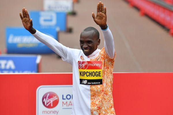 Men's race winner Kenya's Eliud Kipchoge poses for a photograph at the medal ceremony at the 2019 London Marathon in central London on April 28, 2019. Kenya's Eliud Kipchoge won the men's London Marathon on Sunday in a time of two hours two minutes and 37 seconds -- the second fastest time for any marathon. PHOTO | AFP