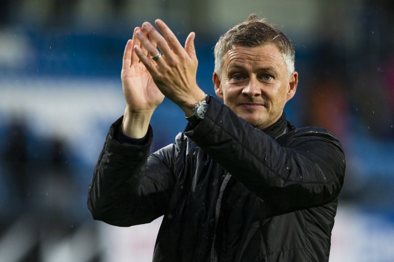 Molde FK´s headcoach Ole Gunnar Solskjaer celebrates after the UEFA Champions League third round, second leg qualifying football match between Molde FK and Hibernian at the Aker Stadium in Molde, Norway, on August 16, 2018. PHOTO/AFP