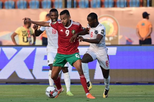 Morocco's forward Sofiane Boufal (C) is marked by Namibia's midfielder Petrus Shitembi (L) and Namibia's midfielder Larry Horaeb during the 2019 Africa Cup of Nations (CAN) football match between Morocco and Namibia at the Al Salam Stadium in Cairo on June 23, 2019. PHOTO/AFP