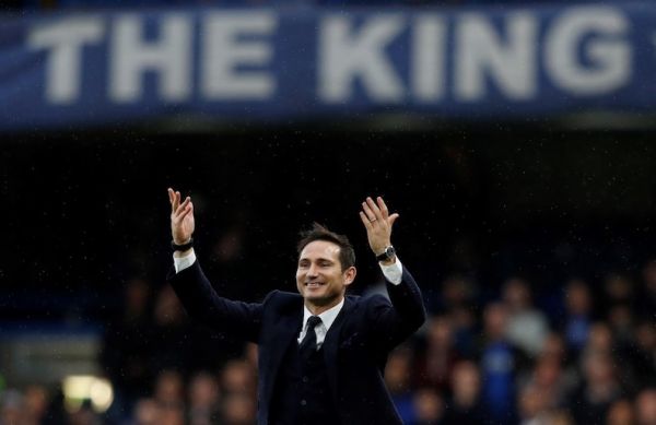 n this file photo taken on February 25, 2017 Chelsea and England former football player Frank Lampard gestures to the fans on the pitch at half-time during the English Premier League football match between Chelsea and Swansea at Stamford Bridge in London on February 25, 2017. PHOTO/AFP