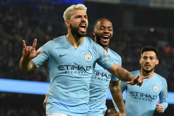 n this file photo taken on February 27, 2019 Manchester City's Argentinian striker Sergio Aguero (L) celebrates after scoring the opening goal from the penalty spot during the English Premier League football match between Manchester City and West Ham United at the Etihad Stadium in Manchester, north west England. Premier League clubs will return to training in small groups from Tuesday after the latest stage of "Project Restart" was approved on Monday, May 18. PHOTO | AFP