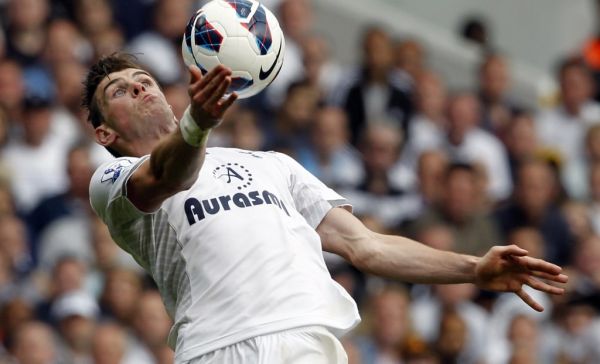 n this file photo taken on May 19, 2013 Tottenham Hotspur's Welsh midfielder Gareth Bale controls the ball during the English Premier League football match between Tottenham Hotspur and Sunderland at White Hart Lane in north London. Gareth Bale's agents are talking to Tottenham about a deal that would see the Real Madrid forward return to his former club. PHOTO | AFP