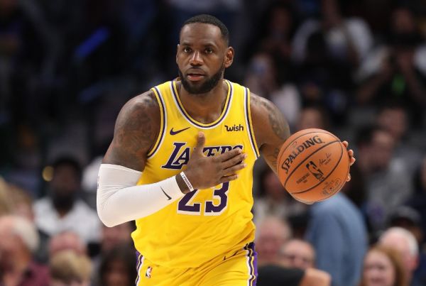 n this file photo taken on November 1, 2019 LeBron James #23 of the Los Angeles Lakers dribbles the ball at American Airlines Center in Dallas, Texas. LeBron James scored 30 points, grabbed 10 rebounds and passed off 11 assists on November 5, leading the Los Angeles Lakers to a 118-112 comeback NBA victory at Chicago with his third consecutive triple double. PHOTO | AFP