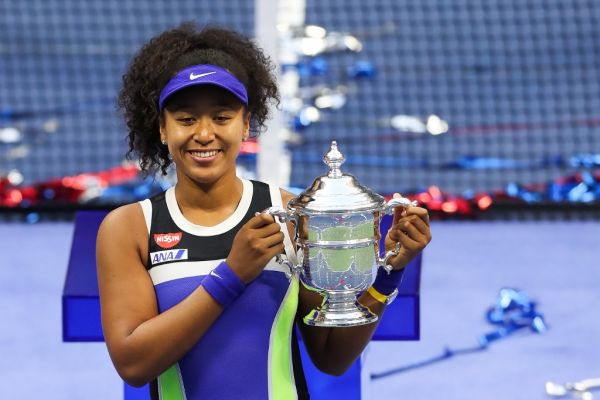 Naomi Osaka of Japan celebrates with the trophy after winning her Women's Singles final match against Victoria Azarenka of Belarus on Day Thirteen of the 2020 US Open at the USTA Billie Jean King National Tennis Center on September 12, 2020 in the Queens borough of New York City. PHOTO | AFP