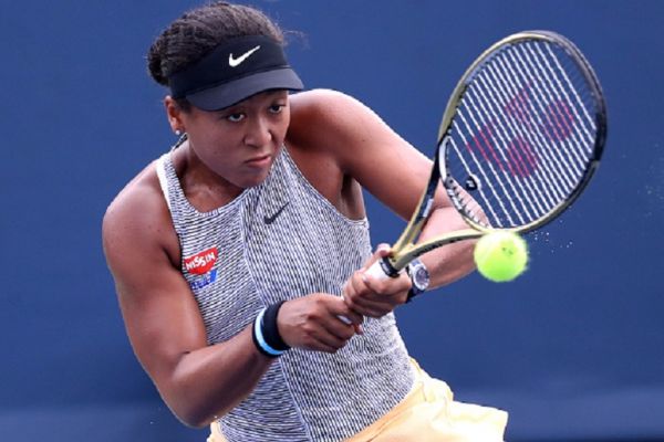 Naomi Osaka of Japan returns a shot to Aliaksandra Sasnovich of Belarus during Day 5 of the Western and Southern Open at Lindner Family Tennis Center on August 14, 2019 in Mason, Ohio. PHOTO/ GETTY IMAGES