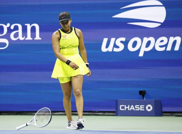 Naomi Osaka of Japan throws her tennis racket after losing a point in the second set against Leylah Fernandez in Arthur Ashe Stadium in the third round of the 2021 US Open Tennis Championships at the USTA Billie Jean King National Tennis Center on Friday, September 3, 2021 in New York City. PHOTO | Alamy