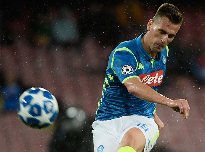 Napoli's Polish forward Arkadiusz Milik shoots during the UEFA Champions League group C football match between Napoli and Liverpool on October 3, 2018 at the San Paolo stadium in Naples. PHOTO/AFP