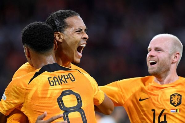 Netherlands' defender Virgil van Dijk (2ndL) is congratulated by teammates after scoring a goal during the UEFA Nations League's League A Group 4 football match between The Netherlands and Belgium, at Johan Cruyff ArenA in Amsterdam on September 25, 2022. PHOTO | AFP