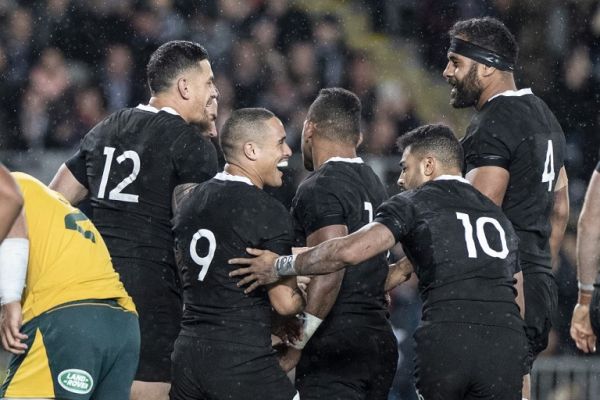 New Zealand's Sonny Bill Williams (L) celebrates a try with teammates during the Rugby Championship Bledisloe Cup Test match between the New Zealand All Blacks and Australia in Auckland on August 17, 2019. PHOTO | AFP