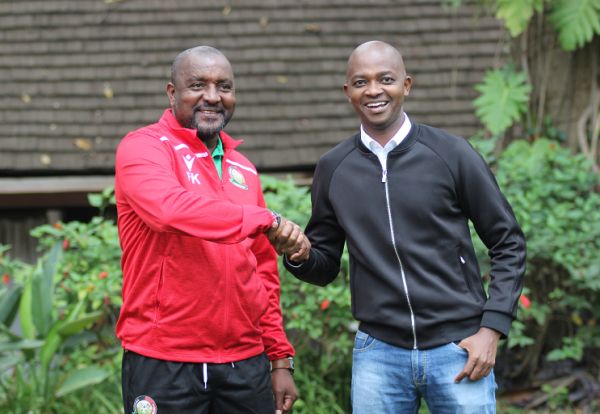 Newly appointed Harambee Stars head coach Francis Kimanzi (left) with Football Kenya Federation President Nick Mwendwa during his unveiling in Nairobi on August 20, 2019. PHOTO/ FKF