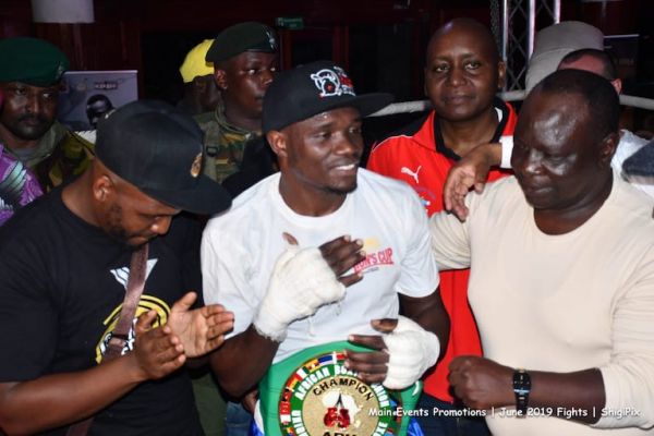 Newly crowned ABU Welterweight boxing champion, Rayton 'Boom Boom' Okwiri poses with his belt at Charter Hall, Nairobi on Saturday, June 8, 2019. PHOTO/Courtesy