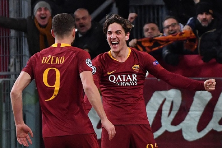 Nicolo Zaniolo (R) celebrates with AS Roma Serbian defender Aleksandar Kolarov after he scored his second goal during the UEFA Champions League round of 16, first leg football match AS Roma vs FC Porto on February 12, 2019 at the Olympic stadium in Rome. PHOTO/GettyImages