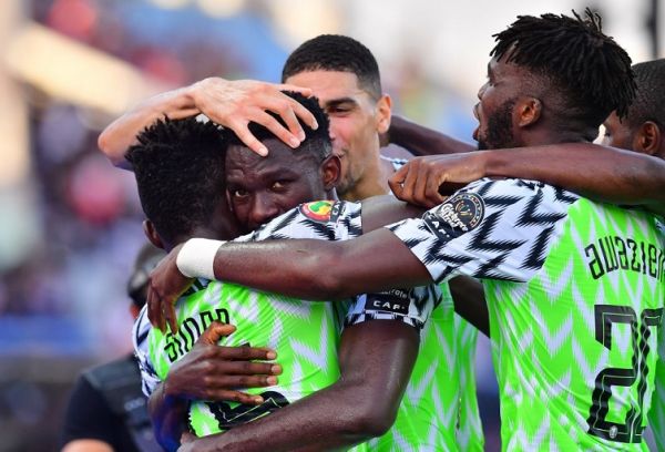 Nigeria's defender Kenneth Omeruo (2nd-L) celebrates his goal during the 2019 Africa Cup of Nations (CAN) football match between Nigeria and Guinea at the Alexandria Stadium on June 26 , 2019. PHOTO | AFP