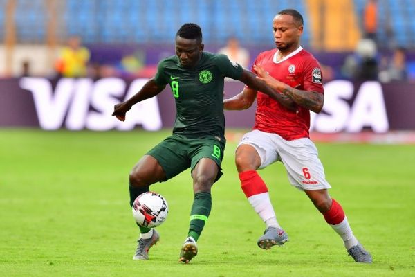 Nigeria's midfielder Oghenekaro Etebo (O) vies for the ball with Madagascar's midfielder Marco Ilaimaharitra during the 2019 Africa Cup of Nations (CAN) Group B football match between Madagascar and Nigeria at the Alexandria Stadium on June 30, 2019. PHOTO | AFP