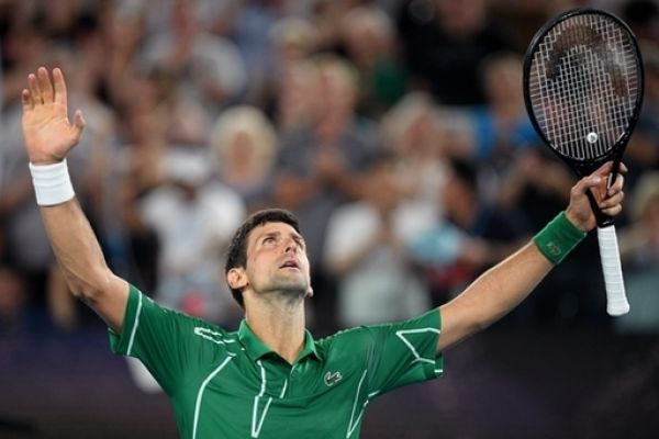 Novak Djokovic of Serbia celebrates after winning the men's singles semi final against Roger Federer of Switzerland on day 11 of the Australian Open tennis tournament at Rod Laver Arena in Melbourne, Thursday, January 30, 2020. PHOTO | PA Images