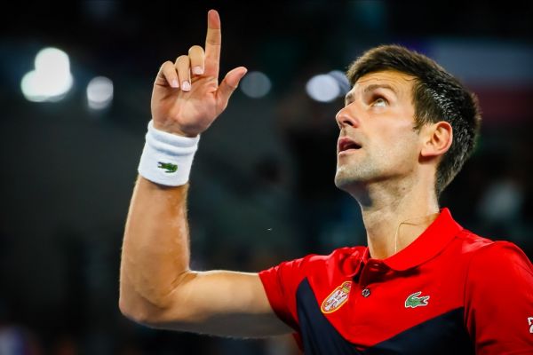 Novak Djokovic of Serbia celebrates his victory against Kevin Anderson of South Africa during their men's singles match on day two of the ATP Cup tennis tournament in Brisbane on January 4, 2020. PHOTO | AFP