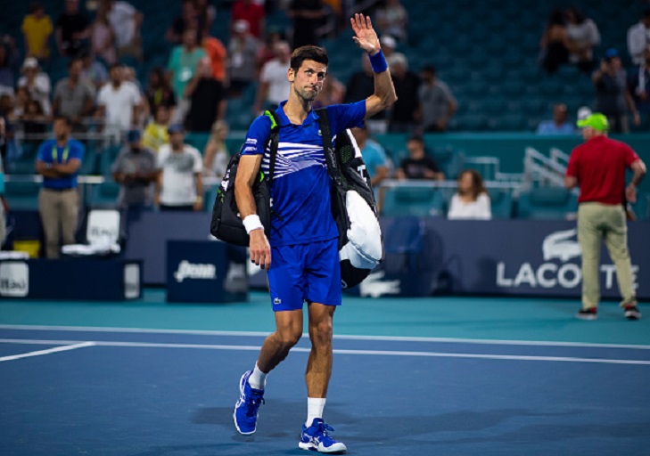 Novak Djokovic of Serbia waves to the crowd as he leaves the court after losing against Roberto Bautista Agut of Spain in the fourth round of the Miami Open on March 25, 2019 in Miami Gardens, Florida. PHOTO/GettyImages