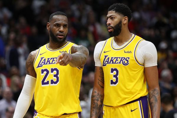 nthony Davis #3 of the Los Angeles Lakers and LeBron James #23 of the Los Angeles Lakers talk during the game against the New Orleans Pelicans at Smoothie King Center on November 27, 2019 in New Orleans, Louisiana. PHOTO | AFP