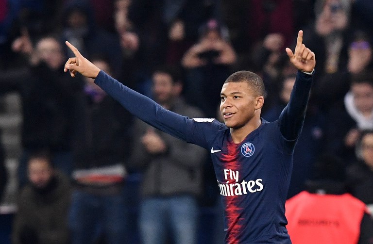 Paris Saint-Germain's French forward Kylian MBappe celebrates after scoring a goal during the French L1 football match between Paris Saint-Germain (PSG) and Nantes (FCN) at the Parc des Princes stadium in Paris on December 23, 2018. PHOTO/AFP