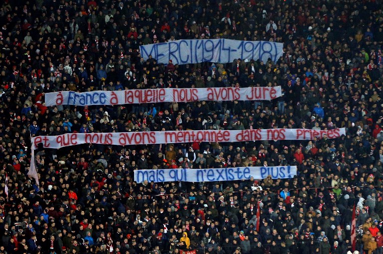Paris supporters hold banners during the European Champions League football match Crvena Zvezda Belgrade vs Paris Saint-Germain (PSG) on December 11, 2018 at Rajko-Mitic stadium in Belgarde.PHOTO/ AFP