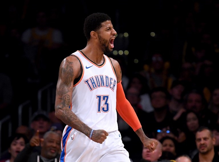 Paul George of the Oklahoma City Thunder celebrates his alley oop dunk during a 107-100 win over the Los Angeles Lakers at Staples Center on January 02, 2019 in Los Angeles, California. PHOTO/AFP