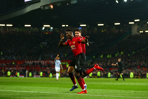 Paul Pogba of Manchester United celebrates after scoring a goal to make it 2-0 during the Premier League match between Manchester United and Huddersfield Town at Old Trafford on December 26, 2018 in Manchester, United Kingdom. PHOTO/Getty Images