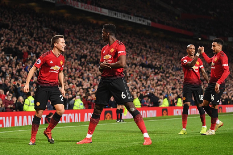 Paul Pogba of Manchester United celebrates as he scores his team's second goal with Ander Herrera and team mates during the Premier League match between Manchester United and AFC Bournemouth at Old Trafford on December 30, 2018 in Manchester, United Kingdom. PHOTO/GettyImages