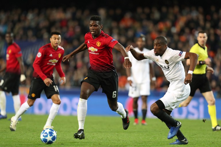 Paul Pogba of Manchester United evades Geoffrey Kondogbia of Valencia during the UEFA Champions League, Group H football match between Valencia CF and Manchester United on December 12, 2018 at Mestalla stadium in Valencia, Spain.PHOTO/AFP