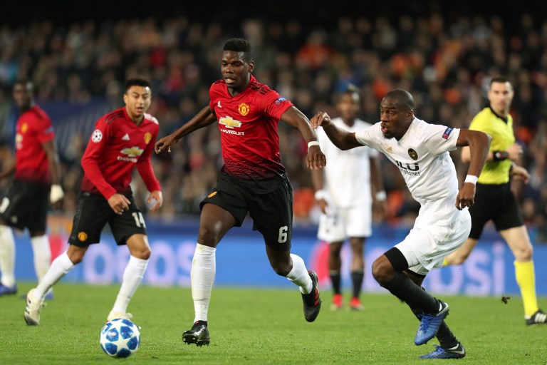 Paul Pogba of Manchester United evades Geoffrey Kondogbia of Valencia during the UEFA Champions League, Group H football match between Valencia CF and Manchester United on December 12, 2018 at Mestalla stadium in Valencia, Spain.PHOTO/AFP