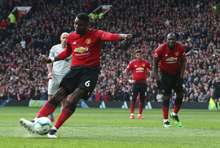 Paul Pogba of Manchester United scores their first goal during the Premier League match between Manchester United and West Ham United at Old Trafford on April 13, 2019 in Manchester, United Kingdom.PHOTO/ GETTY IMAGES