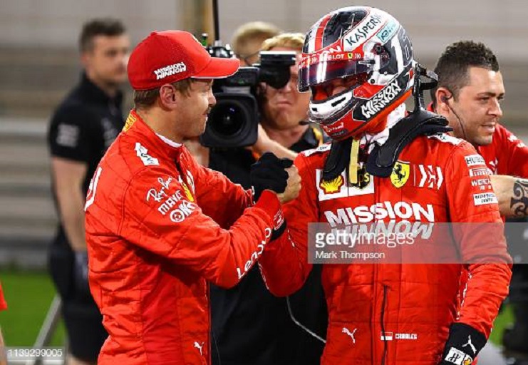 Pole position qualifier Charles Leclerc of Monaco and Ferrari is congratulated by second placed qualifier Sebastian Vettel of Germany and Ferrari in parc ferme during qualifying for the F1 Grand Prix of Bahrain at Bahrain International Circuit on March 30, 2019 in Bahrain, Bahrain. PHOTO/GettyImages