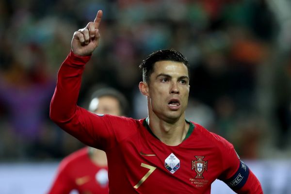Portugal's forward Cristiano Ronaldo celebrates after scoring a goal during the UEFA Euro 2020 Group B football qualification match between Portugal and Lithuania at the Algarve stadium in Faro, Portugal, on November 14, 2019. PHOTO | AFP