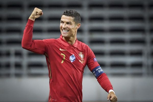 Portugal's forward Cristiano Ronaldo celebrates scoring the opening goal, his 100th goal for Portugal, during the UEFA Nations League football match between Sweden and Portugal on September 8, 2020 in Solna, Sweden. PHOTO | AFP