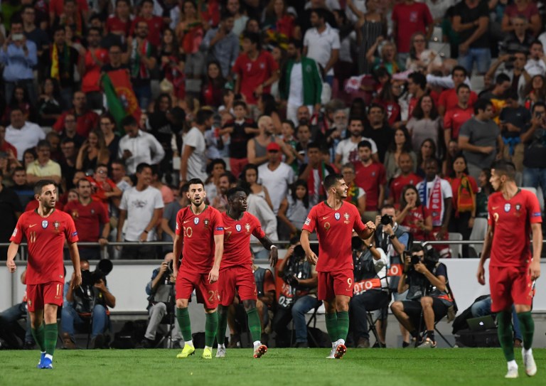 Portuguese forward Andre Silva (2R) celebrates a goal during the UEFA Nations League football match between Portugal and Italy at the Luz stadium in Lisbon on September 10, 2018. PHOTO/AFP