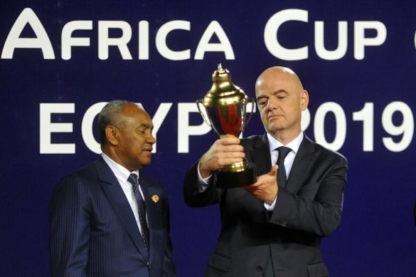 President of CAF Ahmad Ahmad and FIFA President Gianni Infantino take part in the award ceremony of the 2019 Africa Cup of Nations final soccer match between Senegal and Algeria at the Cairo International Stadium. PHOTO | AFP