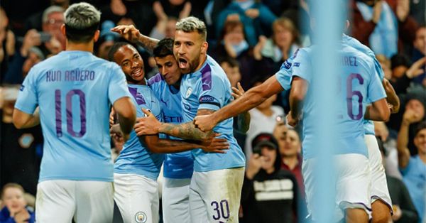 Raheem Sterling of Manchester City celebrates after scoring his team's first goal with team mates during the UEFA Champions League group C match between Manchester City and Dinamo Zagreb at Etihad Stadium on October 1, 2019 in Manchester, United Kingdom. PHOTO/ GETTY IMAGES