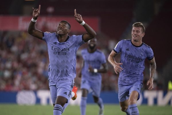 Real Madrid's Austrian defender David Alaba (L) celebrates scoring this team's second goal during the Spanish league football match between UD Almeria and Real Madrid CF at the Municipal Stadium of the Mediterranean Games in Almeria on August 14, 2022. PHOTO | AFP