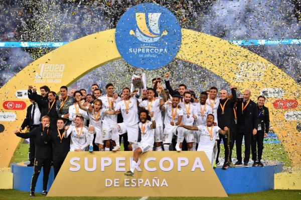 Real Madrid's players celebrate after winning the Spanish Super Cup final between Real Madrid and Atletico Madrid on January 12, 2020, at the King Abdullah Sports City in the Saudi Arabian port city of Jeddah. PHOTO | AFP
