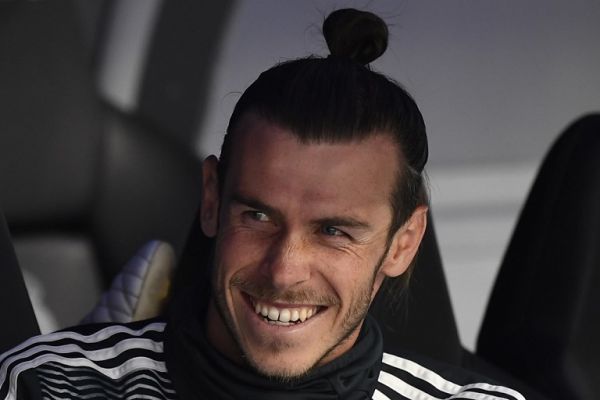 Real Madrid's Welsh forward Gareth Bale sits on the bench during the Spanish League football match between Real Madrid and Real Betis at the Santiago Bernabeu stadium in Madrid on May 19, 2019. PHOTO | AFP
