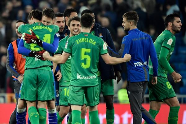 Real Sociedad players celebrate their win at the end of the Spanish Copa del Rey (King's Cup) quarter-final football match Real Madrid CF against Real Sociedad at the Santiago Bernabeu stadium in Madrid on February 06, 2020. PHOTO | AFP