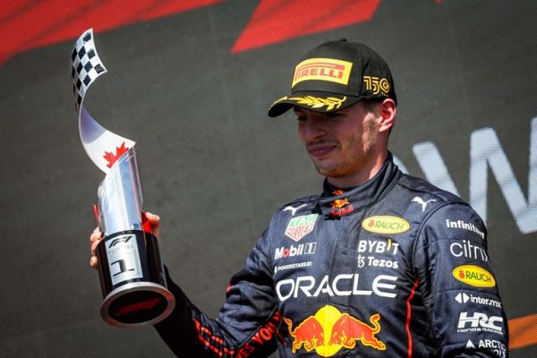 Red Bull Racing RB18, portrait celebrating victory on the podium during the Formula 1 AWS Grand Prix du Canada 2022, 9th round of the 2022 FIA Formula One World Championship, on the Circuit Gilles Villeneuve, from June 17 to 19, 2022 in Montreal, Canada. PHOTO | AFP