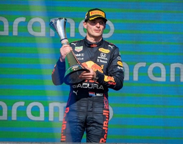 RedBull's Max Verstappen poses with his trophy after winning the United States Grand Prix on Sunday, October 24, 2021. PHOTO | USAToday