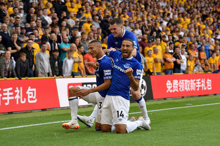 Richarlison (left), Cenk Tosun (right) and Michael Keane celebrate the Brazilian's second goal in their EPL clash at the Molineux where the Blues came out with a 2-2 draw against Wolverhampton Wanderers FC. PHOTO/Everton FC 