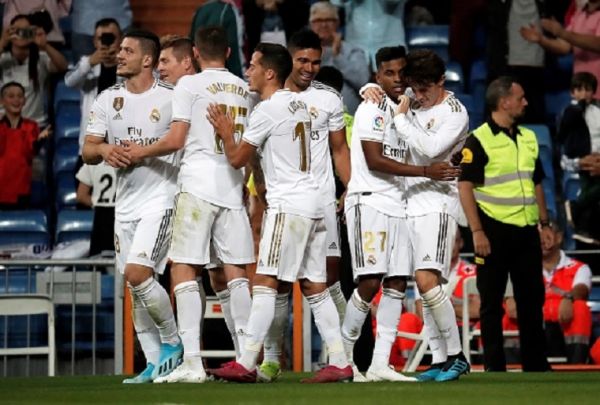 Rodrygo Silva de Goes (R2) of Real Madrid celebrates his goal with his team mates during the La Liga match between Real Madrid and Osasuna at the Santiago Bernabeu Stadium on September 25, 2019 in Madrid Spain. PHOTO/ GETTY IMAGES