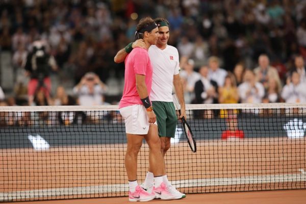 Roger Federer (R) of Switzerland and Rafael Nadal (L) of Spain play a tennis match at Cape Town Stadium as part of an exhibition game held to support the education of African children, on February 8, 2020 in Cape Town, South Africa. PHOTO | AFP