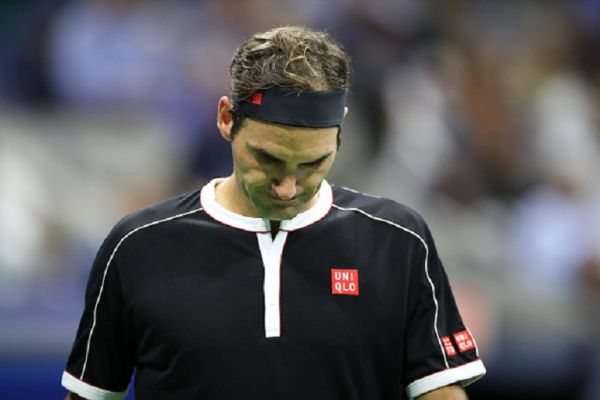 Roger Federer of Switzerland during his loss against Grigor Dimitrov of Bulgaria in the Men's Singles Quarter-Finals match on Arthur Ashe Stadium during the 2019 US Open Tennis Tournament at the USTA Billie Jean King National Tennis Center on September 3rd, 2019 in Flushing, Queens, New York City. PHOTO/GETTY IMAGES